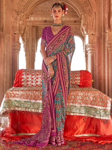 Mesmerizing Teal Blue Patola Printed Georgette Festival Wear Saree